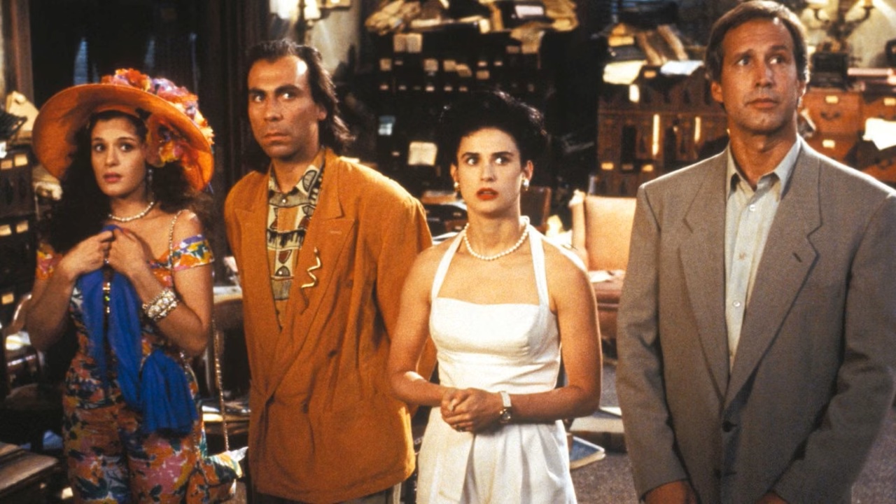 Bertila Damas, Taylor Negron, Demi Moore and Chevy Chase in Nothing But Trouble (1991)