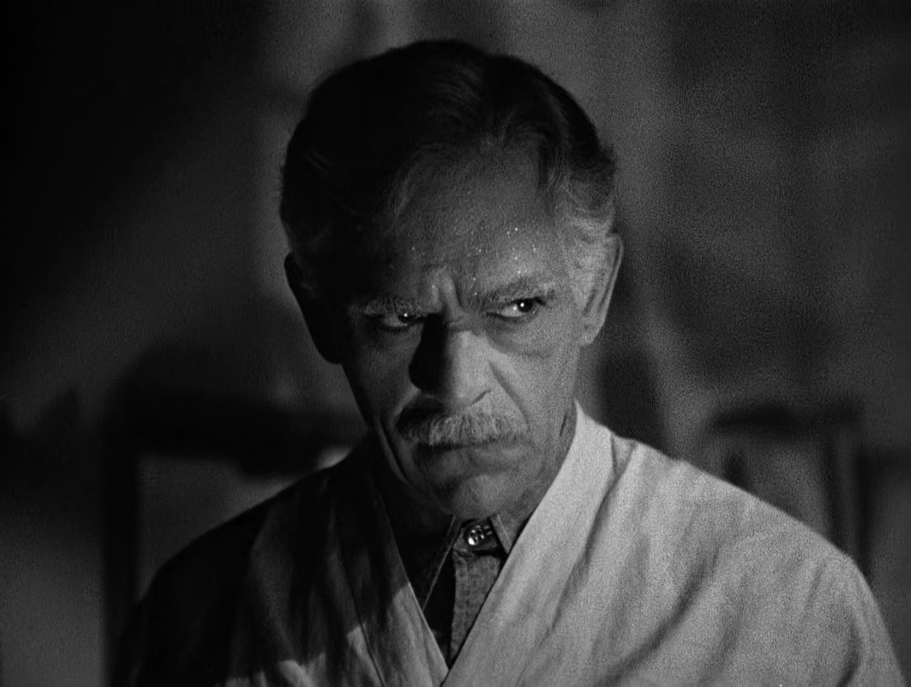 Boris Karloff as Dr John Garth in Before I Hang (1940)