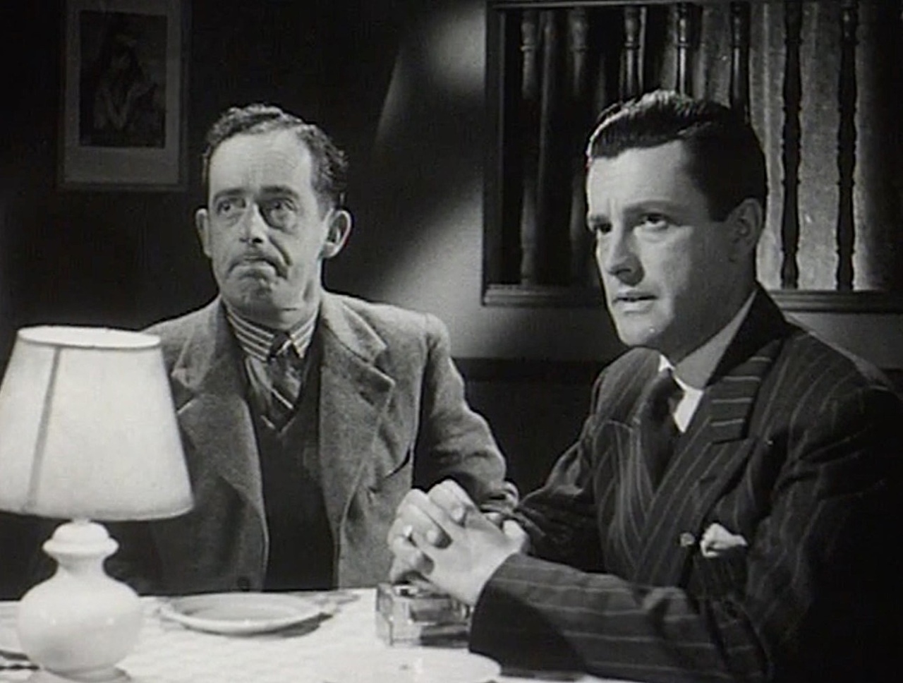 Dick Barton (Don Stannard) and Snowey White (Bruce Walker) in Dick Barton Strikes Back (1949)