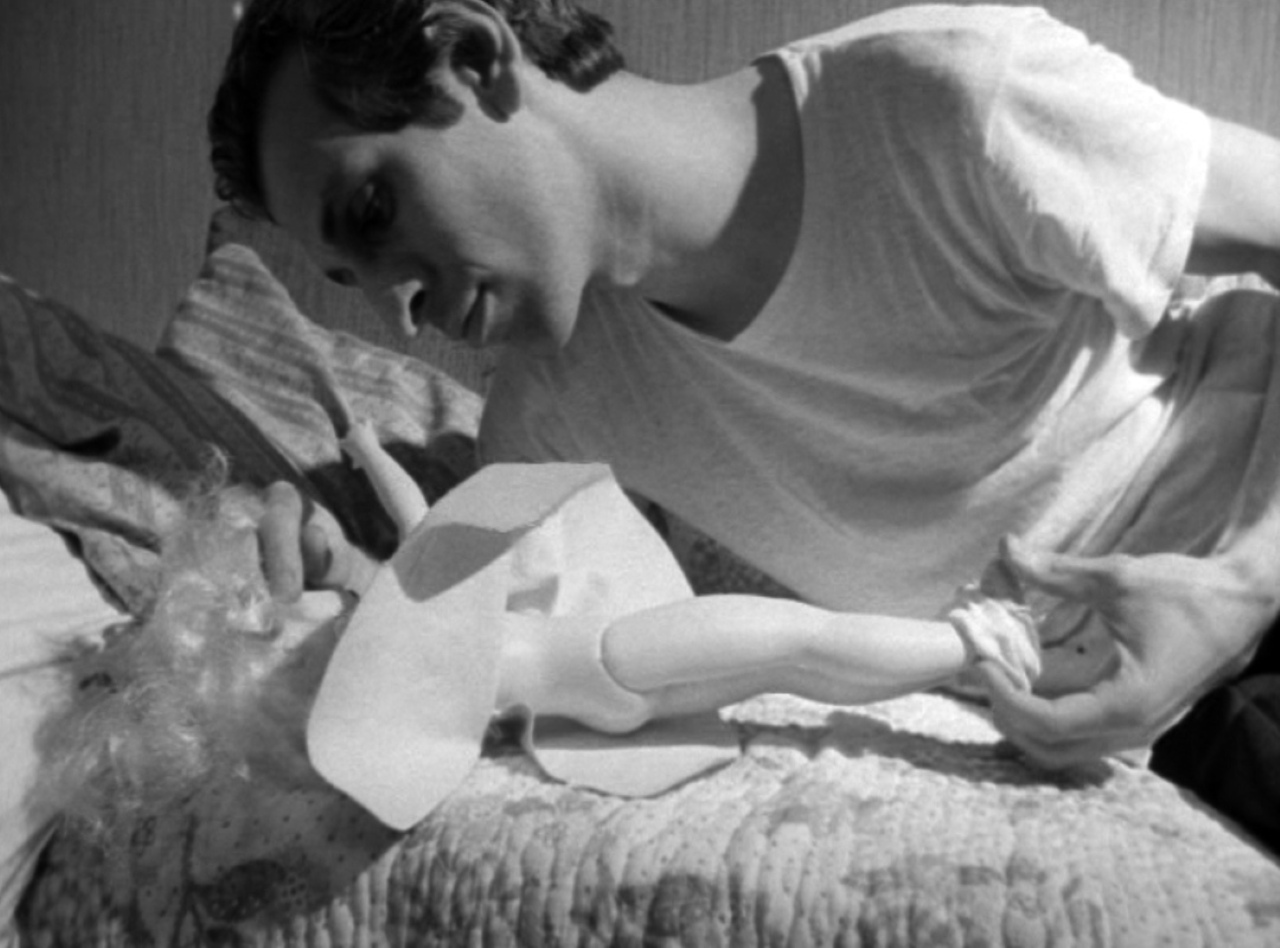 Zeb (Michael Lawrence) with doll in Indecent Desires (1968)