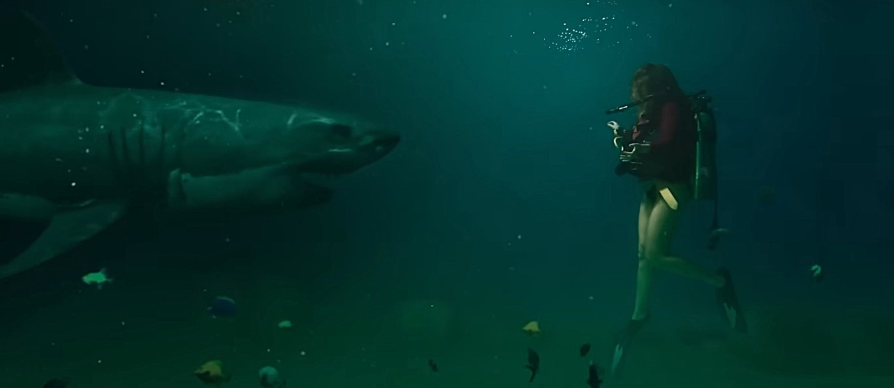 Scout Taylor Compton and shark in Into the Deep (2025)