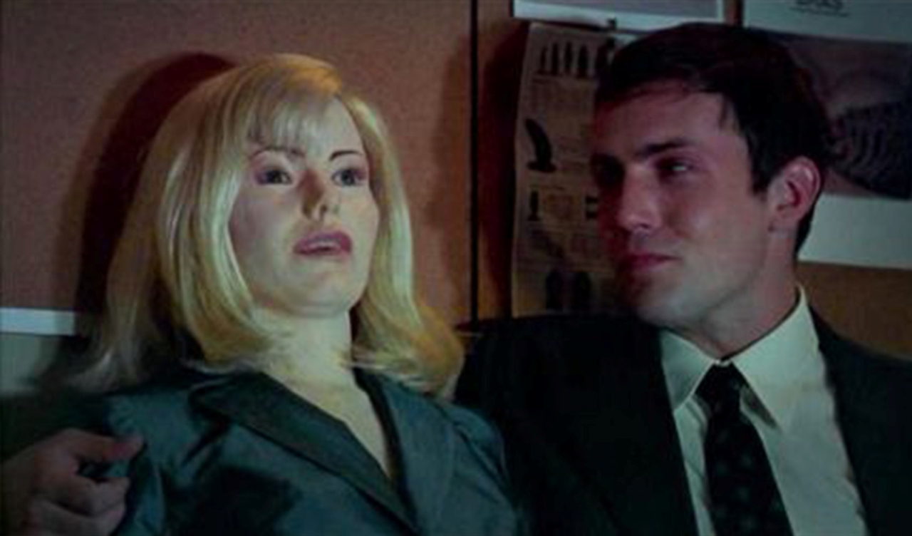 Desmond Harrington and Nikki in Love Object (2003)