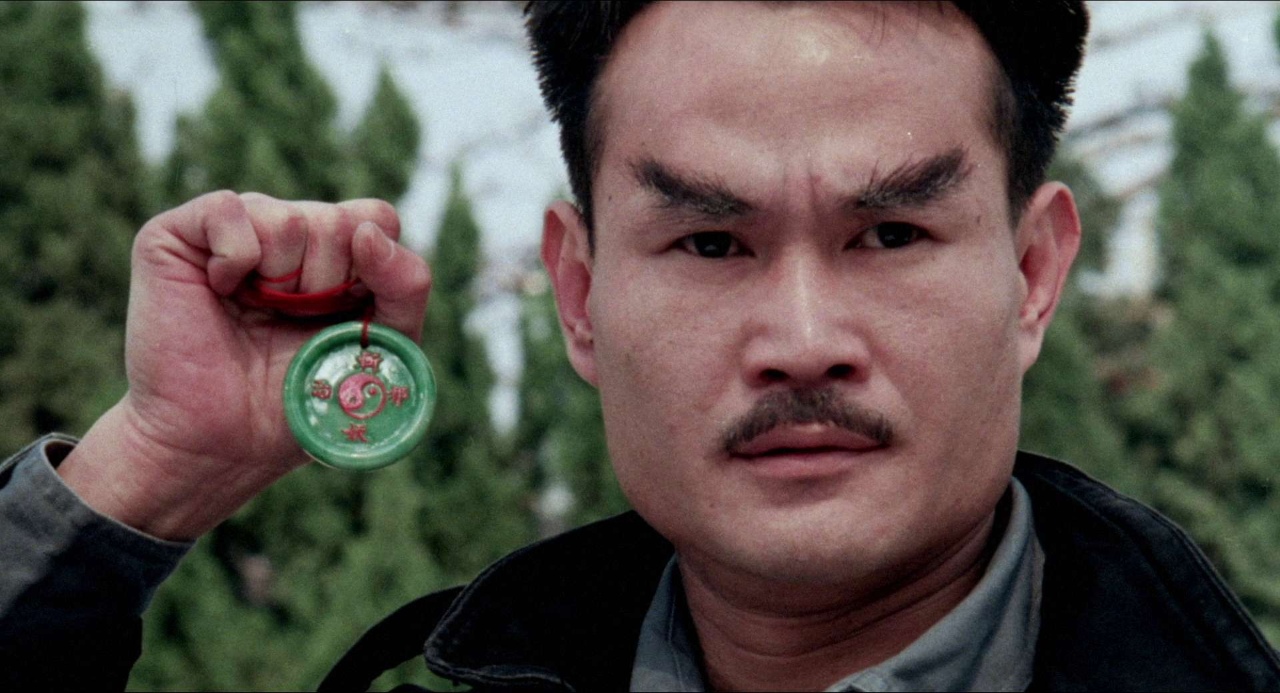 Lam Ching-ying in Magic Cop (1990)